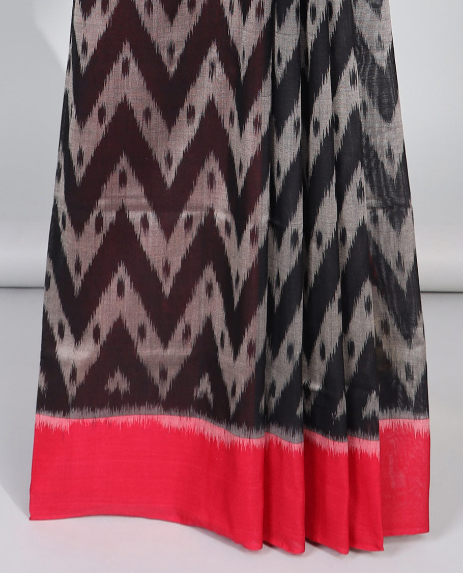 Black gementric ikkat cotton saree with contrast plain border & geometric design pallu