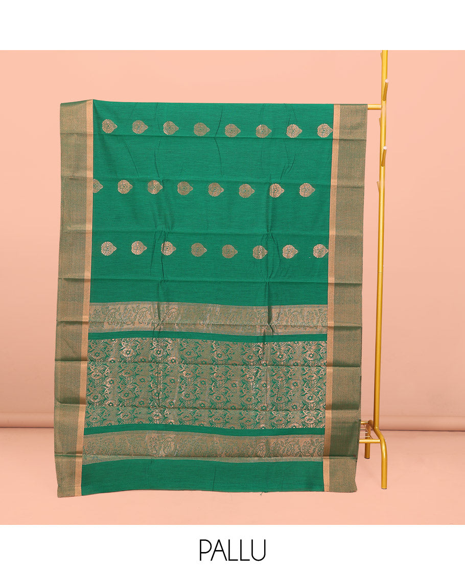Green Semi-Silk Cotton Saree, Accentuated with Zari Buttas All Over Its Body, Highlighted by a Zari Border, Pallu of Intricate Zari Design, and Paired with a Matching Blouse