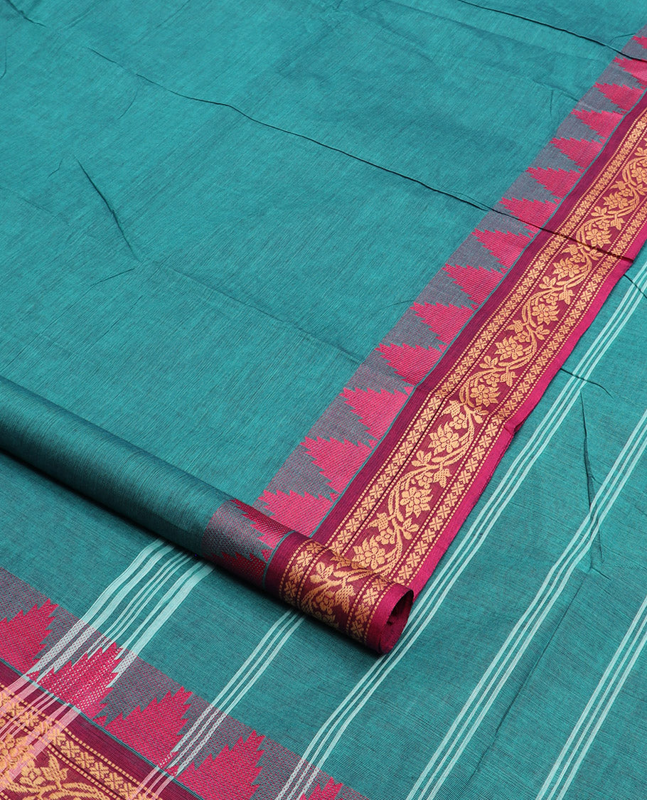 Peacock green plain nine-yard cotton saree, contrast traditional temple border, and striped pallu