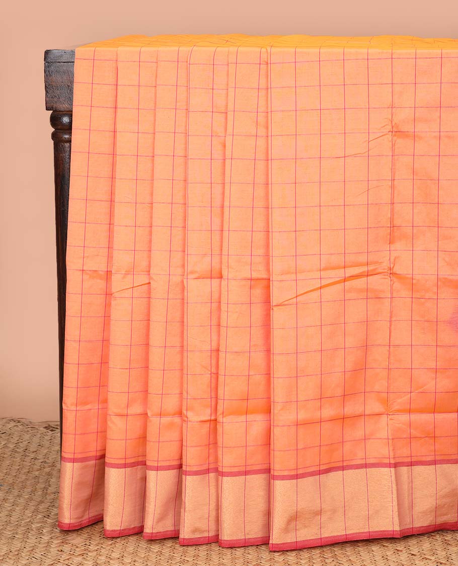 Orange checked poly cotton saree, zari border, and contrast thick zari striped pallu