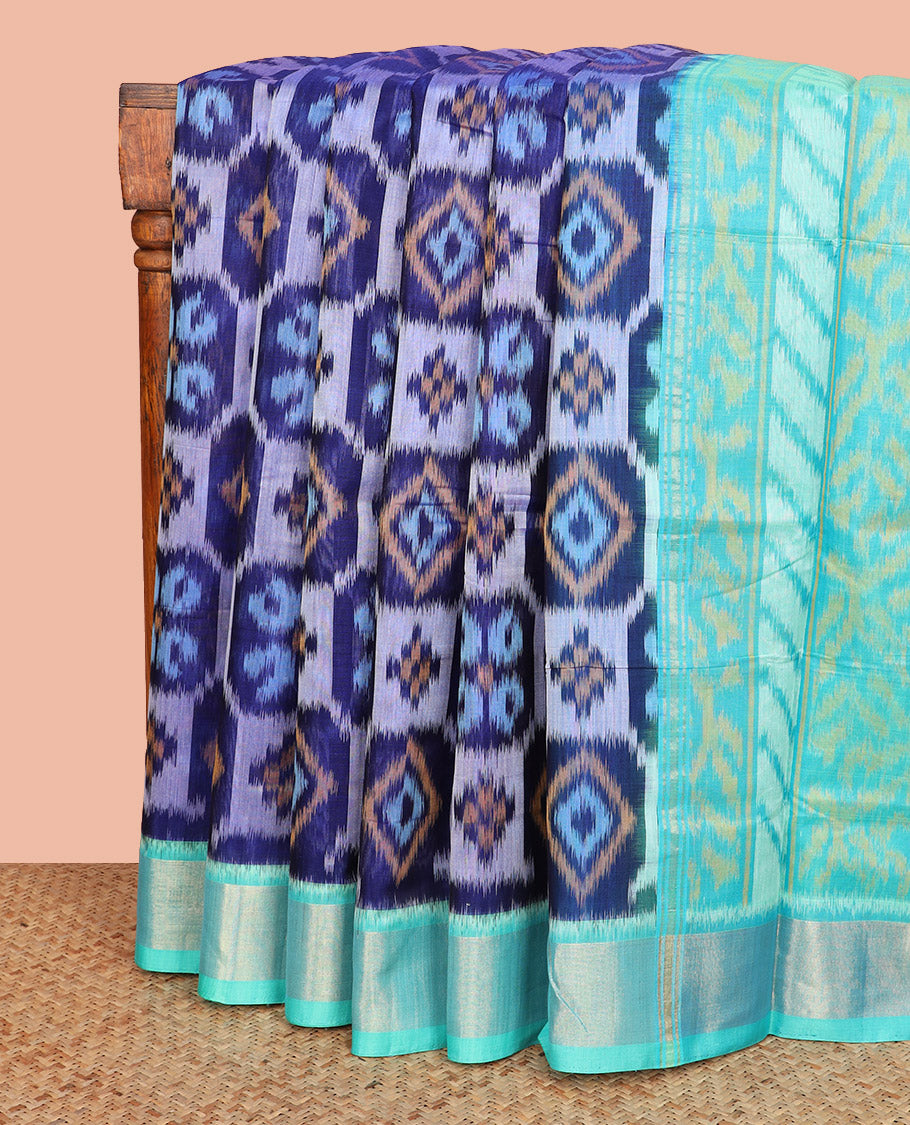 Blue Ikkat Cotton Saree, Accentuated with Ikkat-Style Geometric Patterns All Over Its Body, Complemented by a Contrast Zari Border, Pallu of Geometric Designs in Ikkat Weave, and Paired with a Contrast Blouse