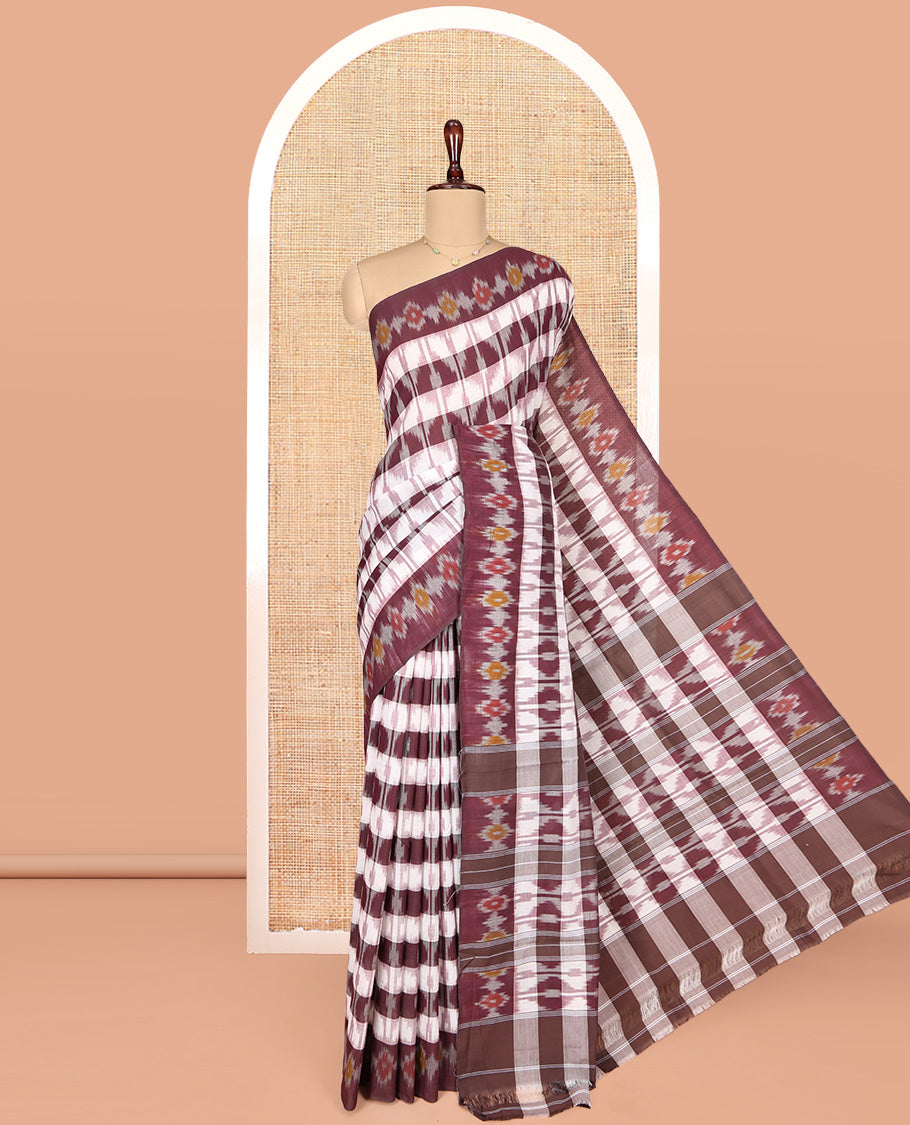 Off-White and Brown Ikkat Cotton Saree, Detailed with Ikkat Checks All Over Its Body, Subtly Sparkled Ikkat-Textured Border, Ikkat-Textured Pallu, and Has No Blouse