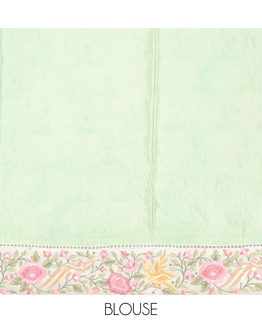 Pista green buttas with floral printed dola silk saree, contrast floral embroidered scallop border