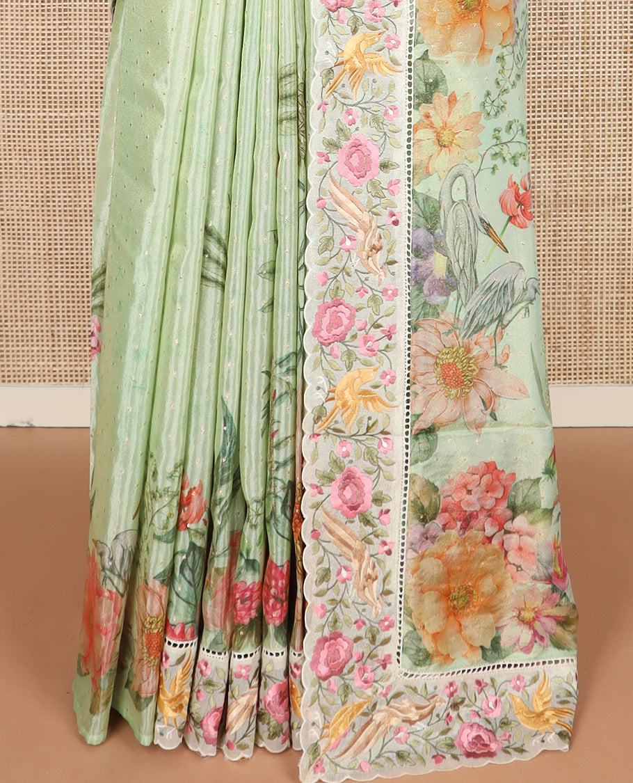 Pista green buttas with floral printed dola silk saree, contrast floral embroidered scallop border