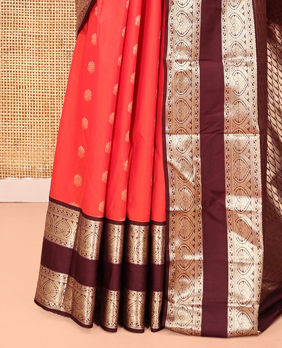 Orange and Brown Budget Silk Saree, Adorned with Zari Buttas All Over Its Body, Complemented by Contrast Rettai Pettu Traditional Zari Border of Jada Nagam, Pallu Steeped with Paisleys, and Paired with a Contrast Blouse