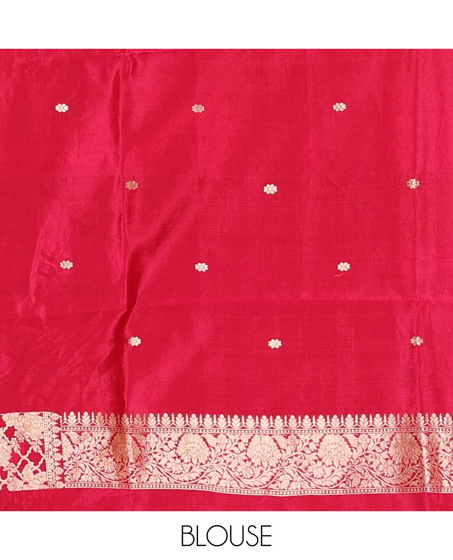 Green Raw Mango Silk Saree Ornamented with Buttas, Complemented by a Contrast Traditional Zari-Design Border, Pallu Depicts Peacock Eye Design, and Paired with a Contrast Blouse