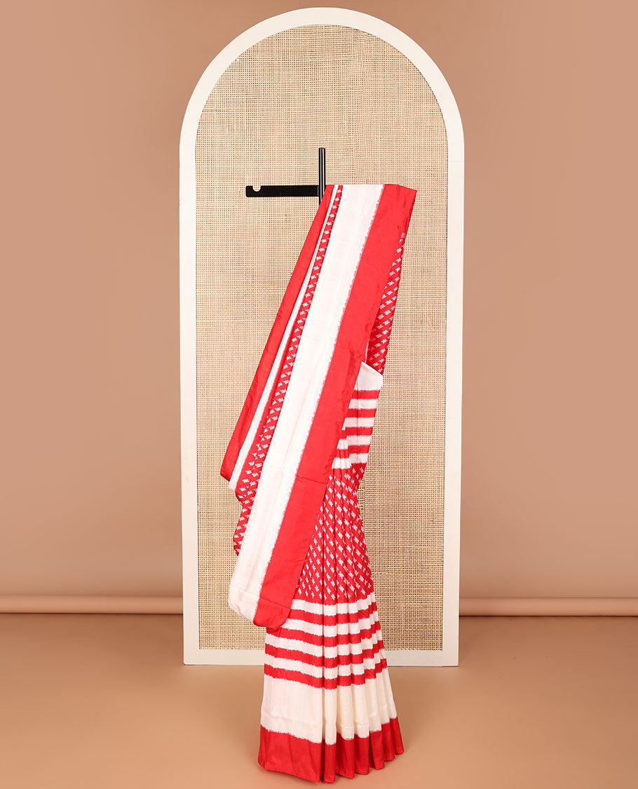 Red motifs ikkat saree with contrast striped border & floral motifs pallu