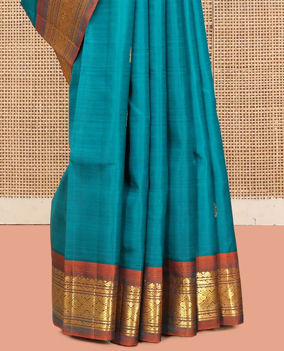 Blue Kanchipuram Silk Saree, Adorned with Zari Buttas, a Contrast One-Sided Zari Border, Zari Striped Pallu, and No Blouse