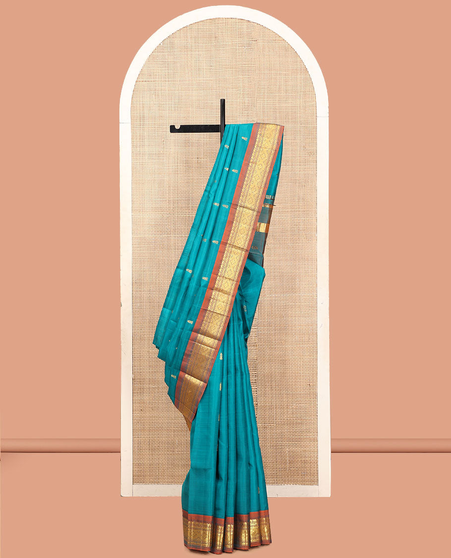 Blue Kanchipuram Silk Saree, Adorned with Zari Buttas, a Contrast One-Sided Zari Border, Zari Striped Pallu, and No Blouse