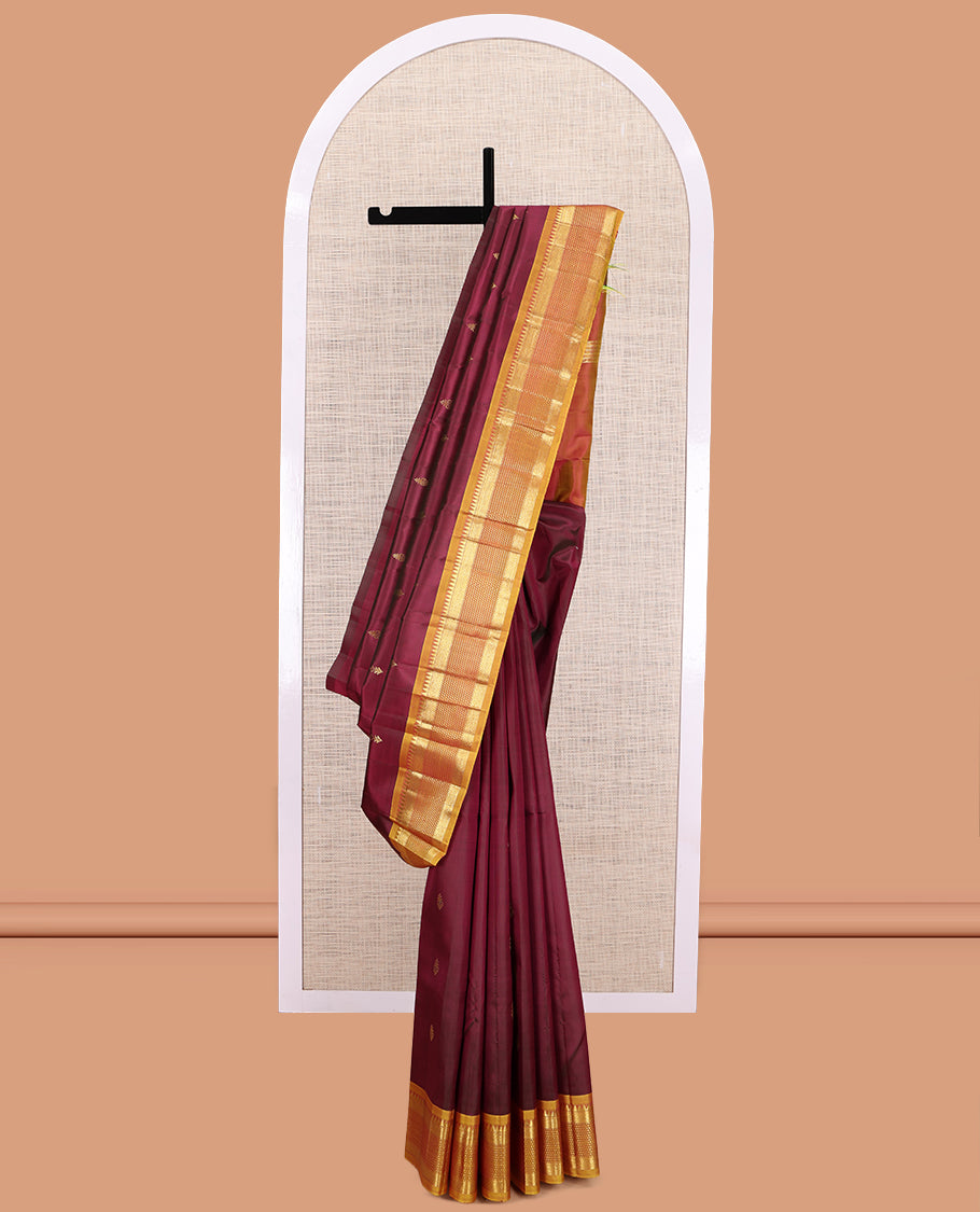 Maroon Kanchipuram Silk Saree, Graced with Zari Buttas, a Contrast One-Sided Border of Rekku, Banaras, Muthu, and Mayil Kann Design, Zari Design Pallu, and No Blouse