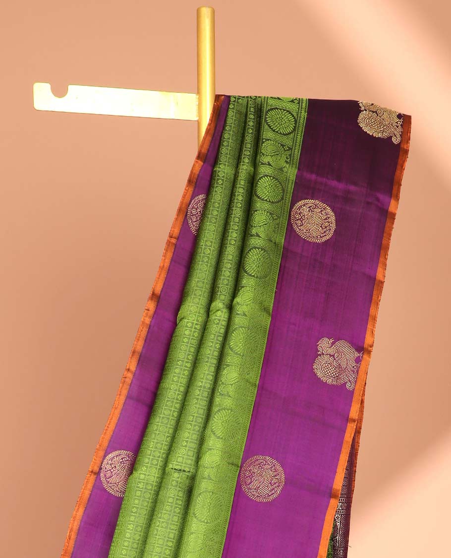 Green floral enclosed with checked design silk saree with contrast border of mayil & intricate zari design pallu
