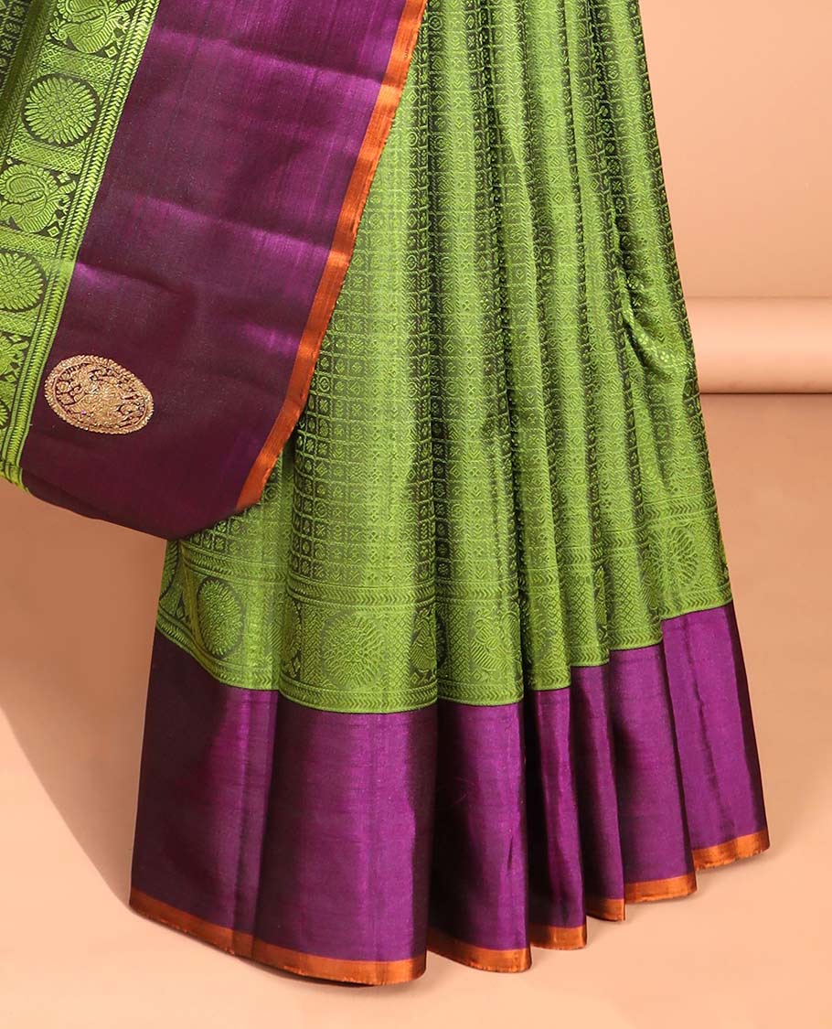 Green floral enclosed with checked design silk saree with contrast border of mayil & intricate zari design pallu