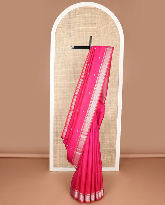 Dark pink floral buttas kancheepuram silk saree with self thread border of thilakam mokku, paun design & jaal pallu