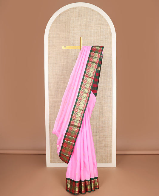 Pink zari buttas Kanchipuram silk saree, contrast one-sided korvai checked border of Banaras,neli & jada nagam & checked pallu of chakram design