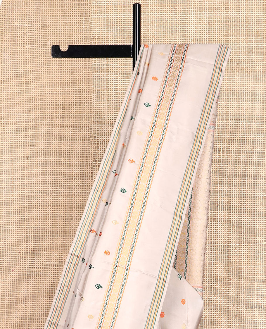 Cream thread buttas Kanchipuram silk saree, rettai pettu border of muthu, neli, and mayil designs, and jaal pallu