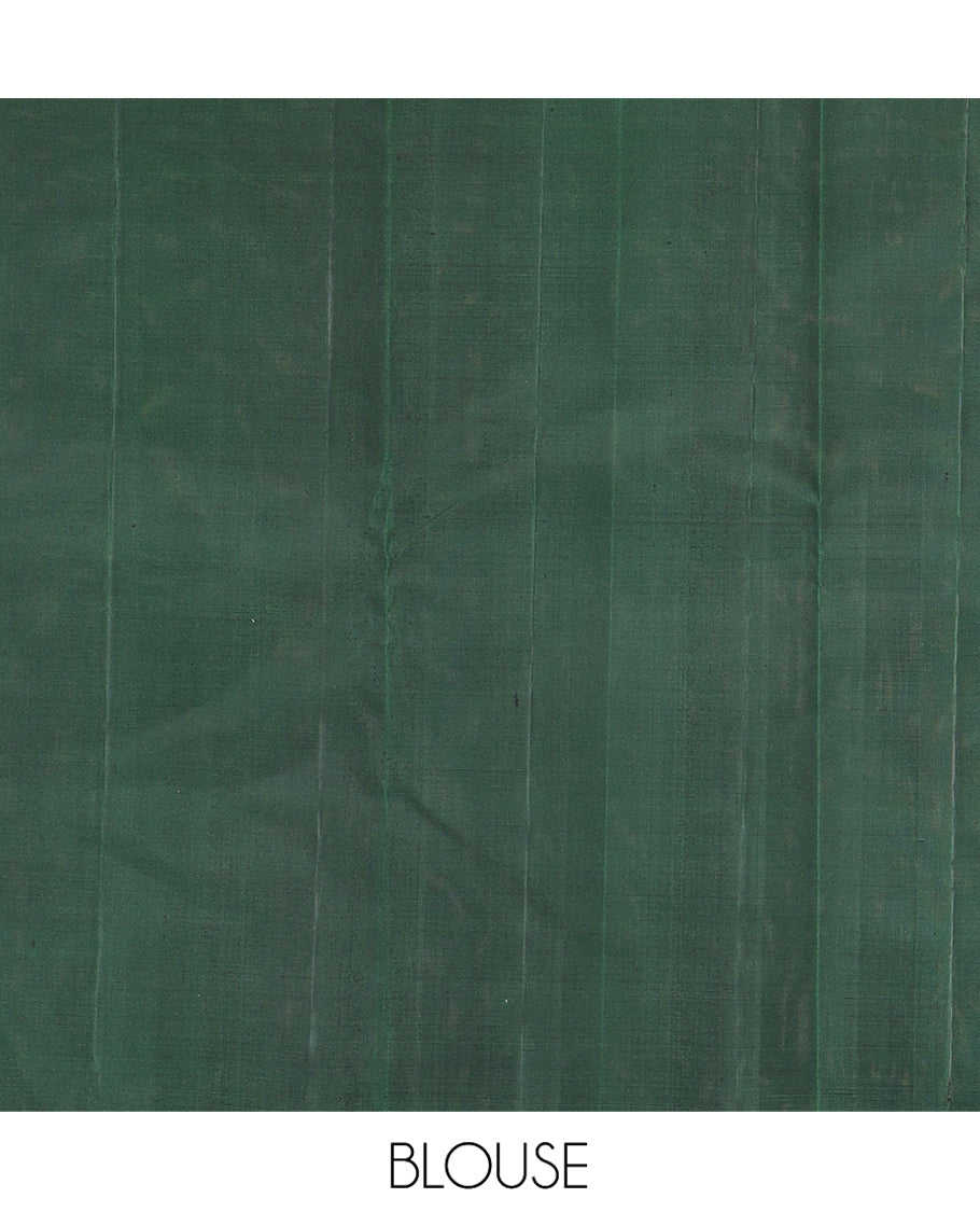 Borderless Green Kanchipuram Silk Saree Highlighted by Annam Buttas and Stripes All Over Its Body, Subtly Sparkled Pallu of Rudraksham, Muthu, Kathir, and Laddu Kamalam Designs, and Paired with a Matching Blouse