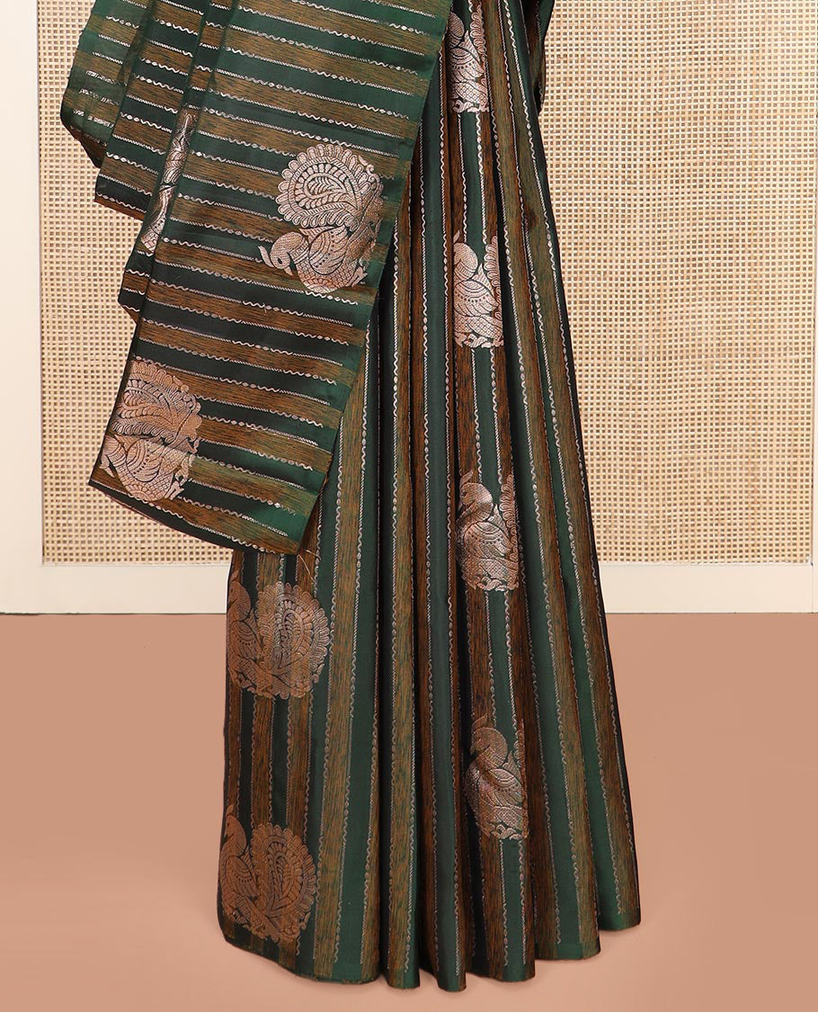 Borderless Green Kanchipuram Silk Saree Highlighted by Annam Buttas and Stripes All Over Its Body, Subtly Sparkled Pallu of Rudraksham, Muthu, Kathir, and Laddu Kamalam Designs, and Paired with a Matching Blouse