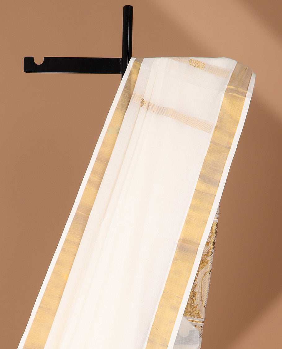 Cream kerala saree with zari stripes, zari border & pallu of peacocks