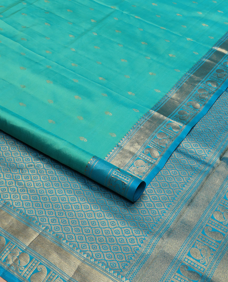 Blue zari buttas nine-yard silk saree, contrast traditional of thilakam, banaras, zari stripes, mayil, and manga designs, and jaal pallu