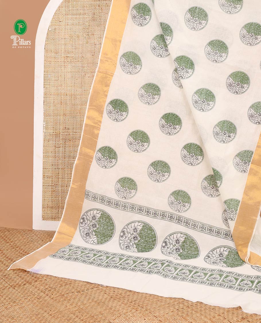 Cream with green flower butta kerla cotton saree with zari bawanchi border & printed pallu along with plain blouse