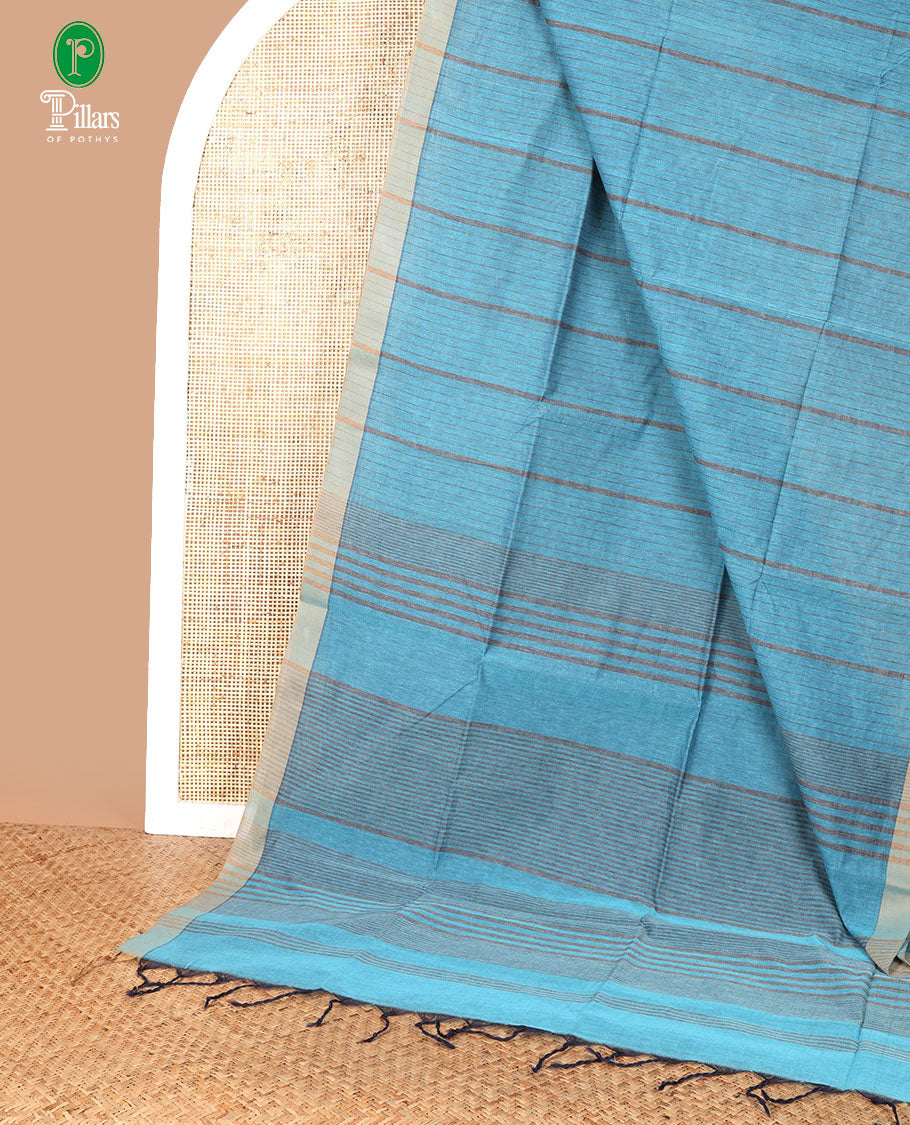 Blue jute cotton saree with contrast piping border & lining pallu along with contrast lining blouse
