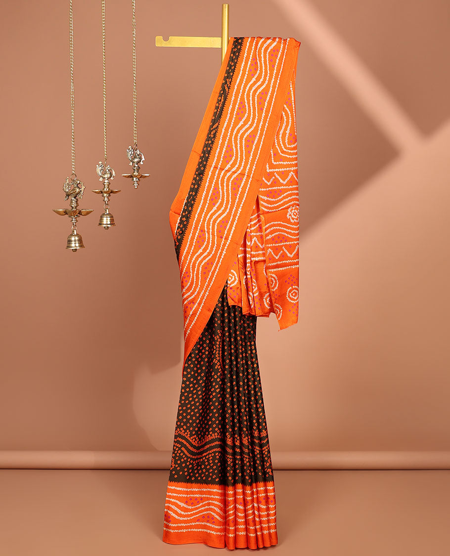 Brown all over bandhani printed crepe silk saree with contrast bandhani printed border