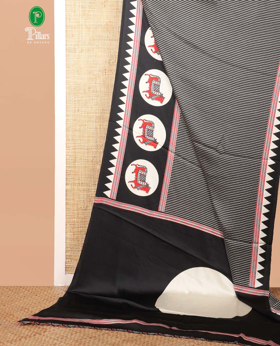 Black vertical line printed modal silk saree with temple, pichwai bentex border & circle butta design pallu along with ajrak printed blouse