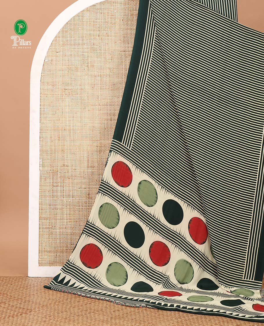 Bottle green vertical stripes printed modal satin saree, a self-border of horizontal stripes print, polka dots printed on the pallu, and an intricate ajrakh-style printed blouse