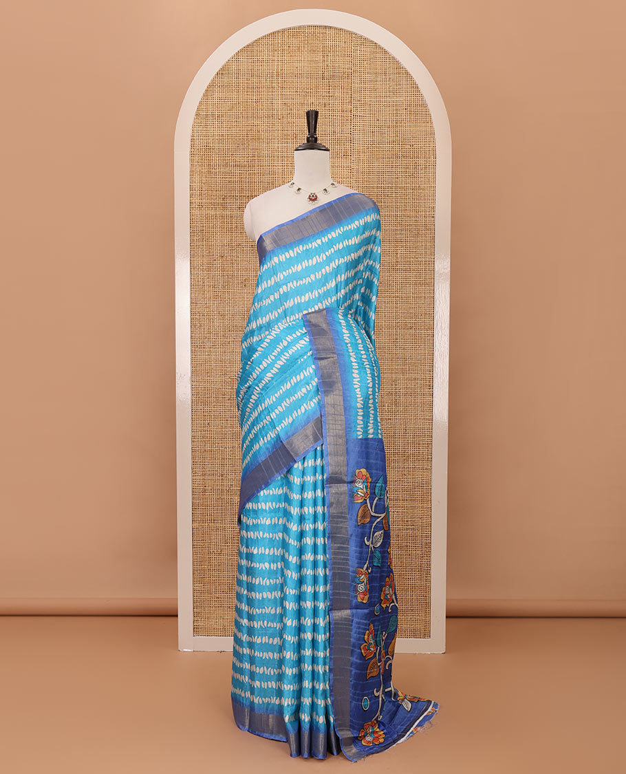 Sky blue uniquely printed soft tussar saree, contrast zari border, kalamkari floral vine printed pallu & kalamkari printed blouse