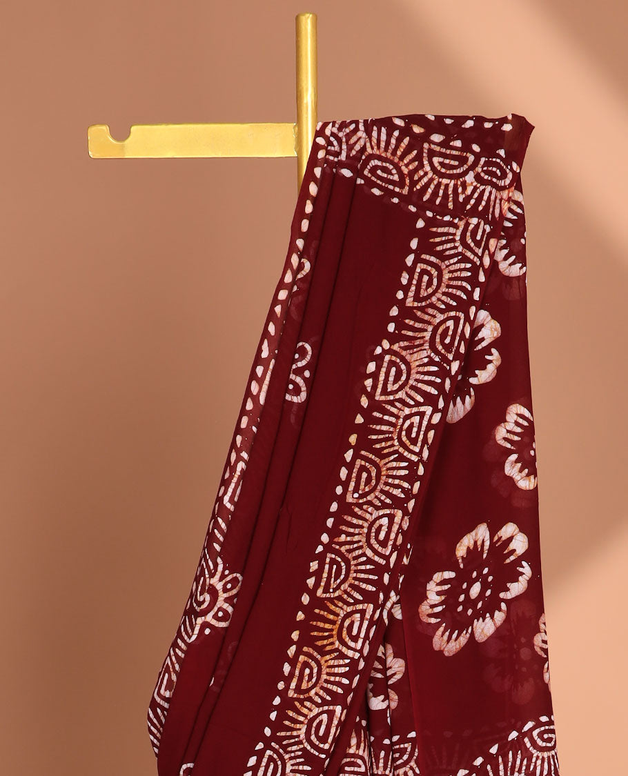 Maroon pathink print georgette saree with pathink print pallu & running blouse