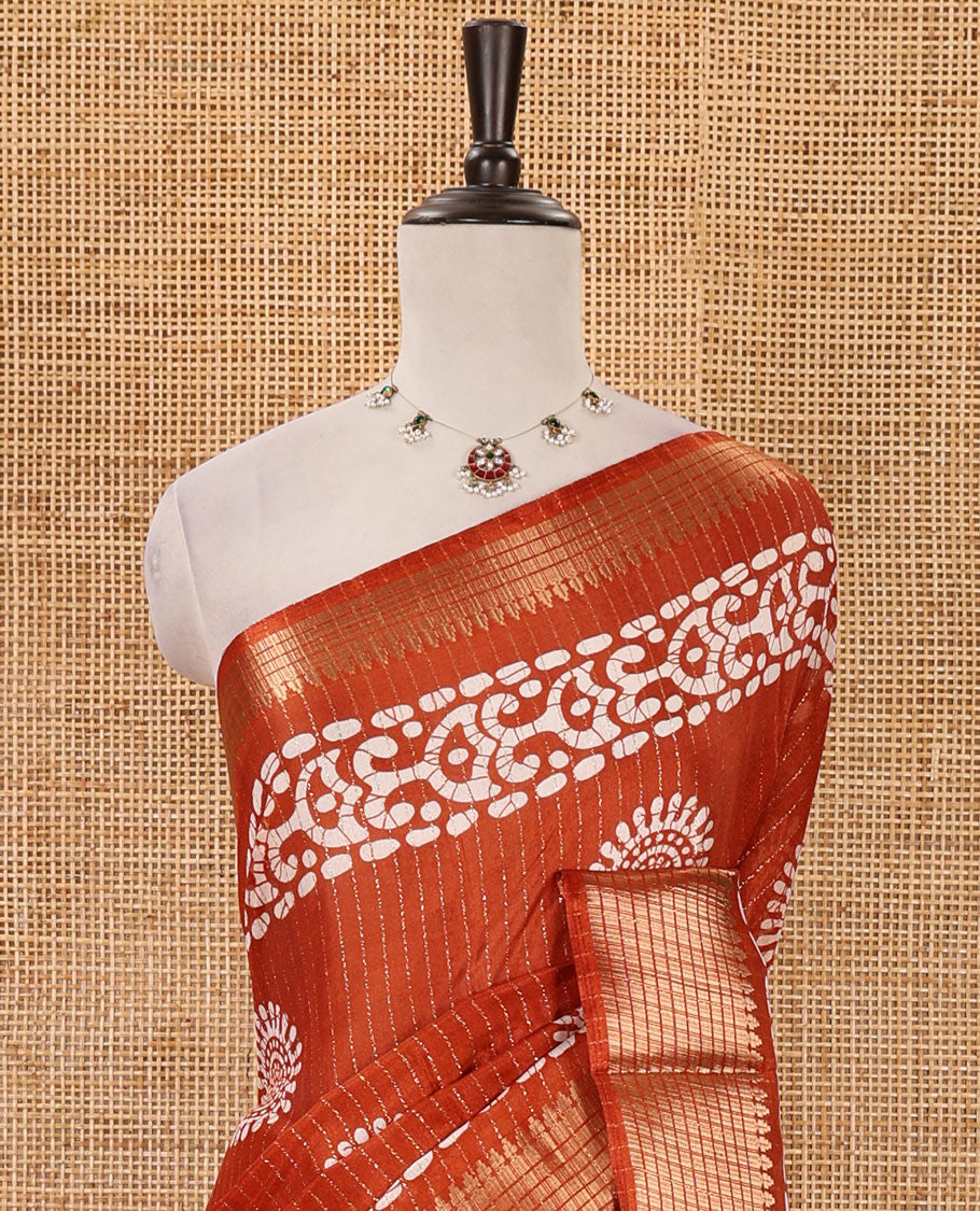 Honey color golden zari striped & batik-printed dola silk saree, traditional zari border & batik printed pallu & matching batik printed blouse