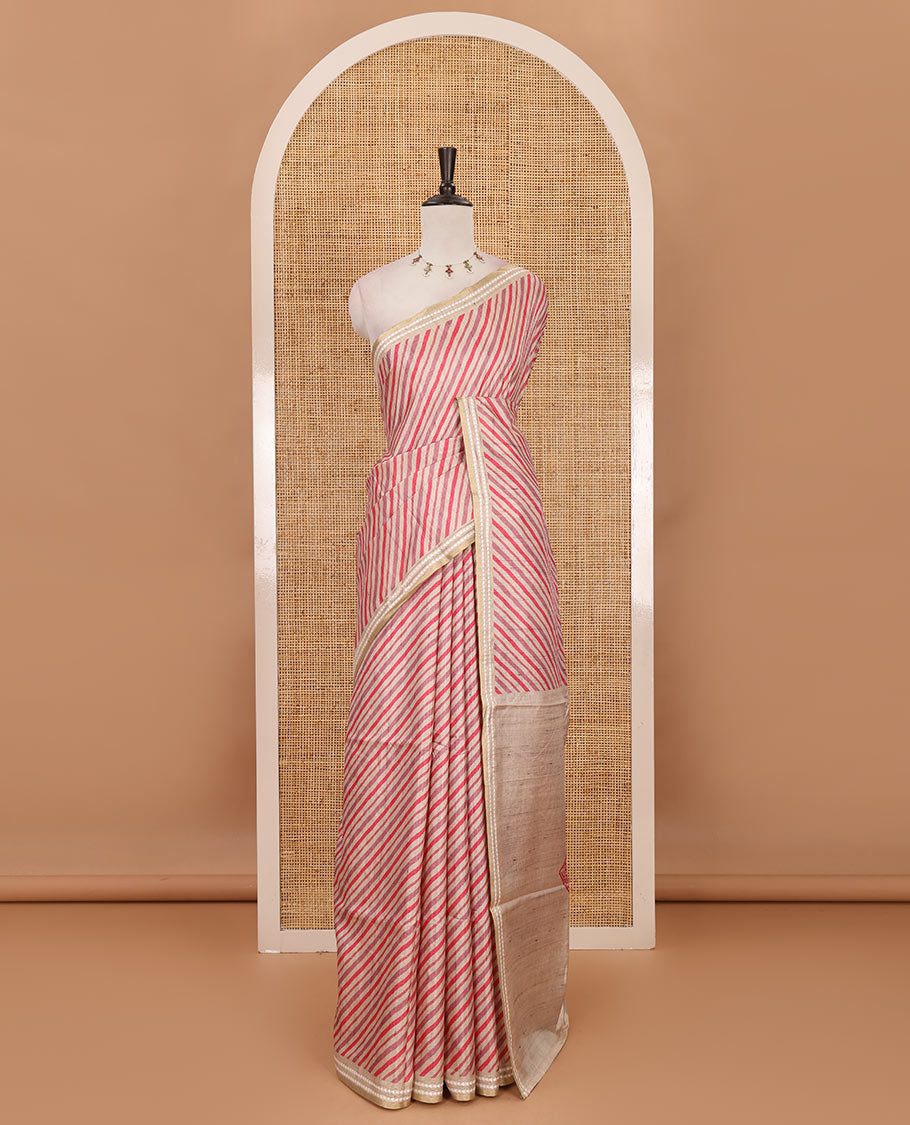 Pink lehariya-style striped semi-tussar saree, contrast resham thread triangle motifs border, diamond printed pallu & contrast printed blouse