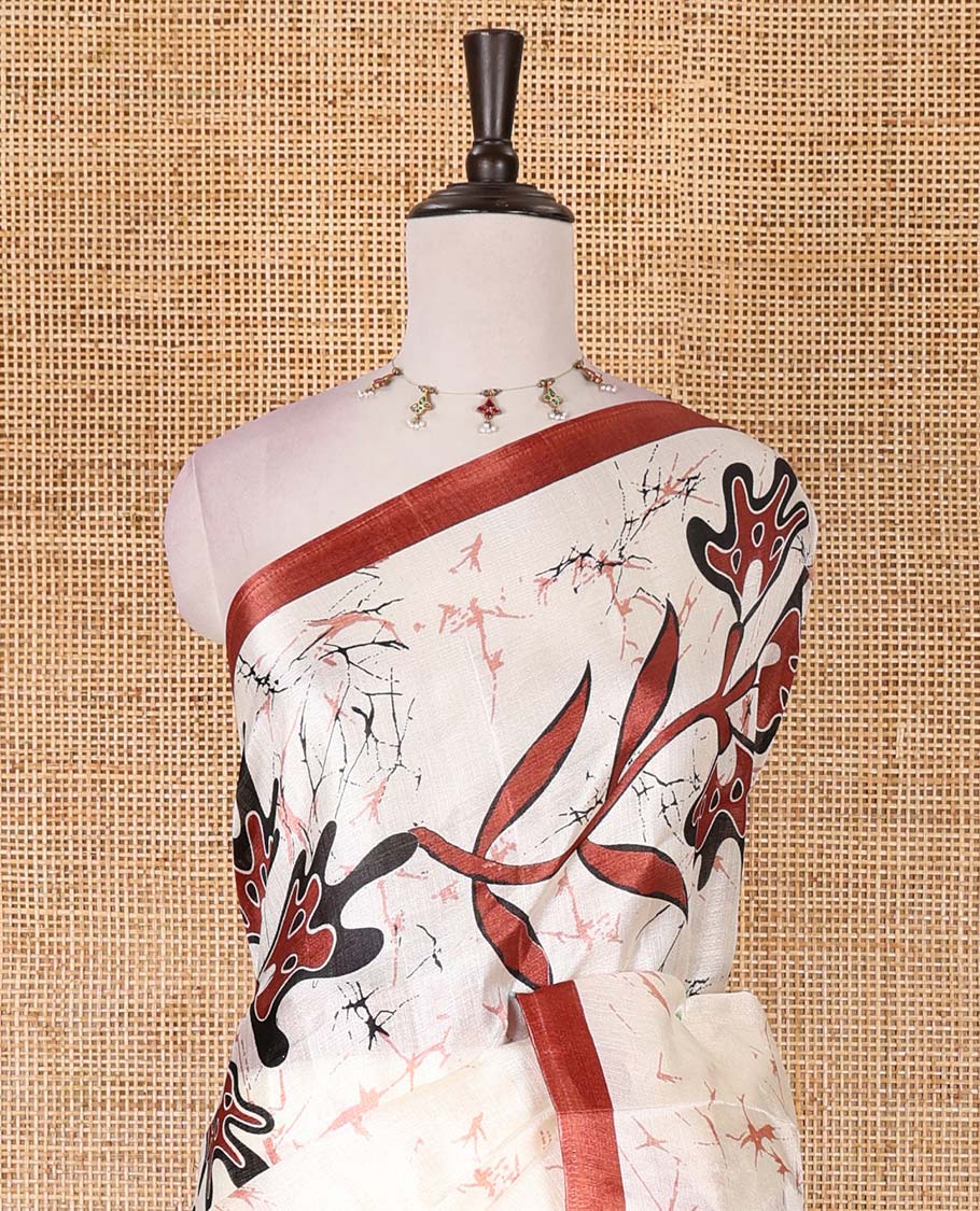 Half-white batik-style floral vine printed khadi cotton saree, contrast brown border, batik floral printed, and contrast flower motifs printed blouse