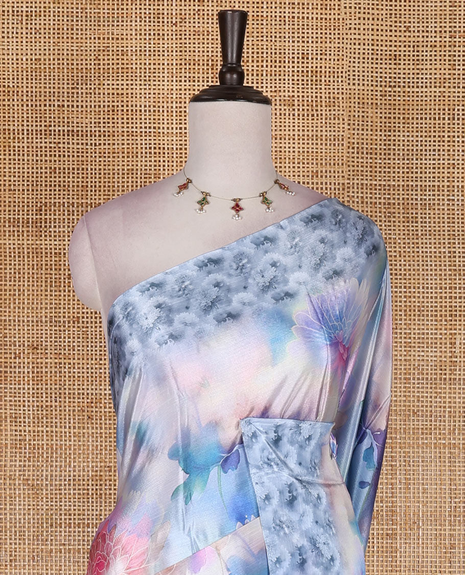 Blue colorful, floral printed turkey crepe saree, floral printed border, pallu, and contrast flower motifs printed blouse