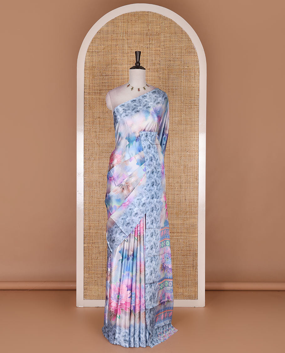 Blue colorful, floral printed turkey crepe saree, floral printed border, pallu, and contrast flower motifs printed blouse