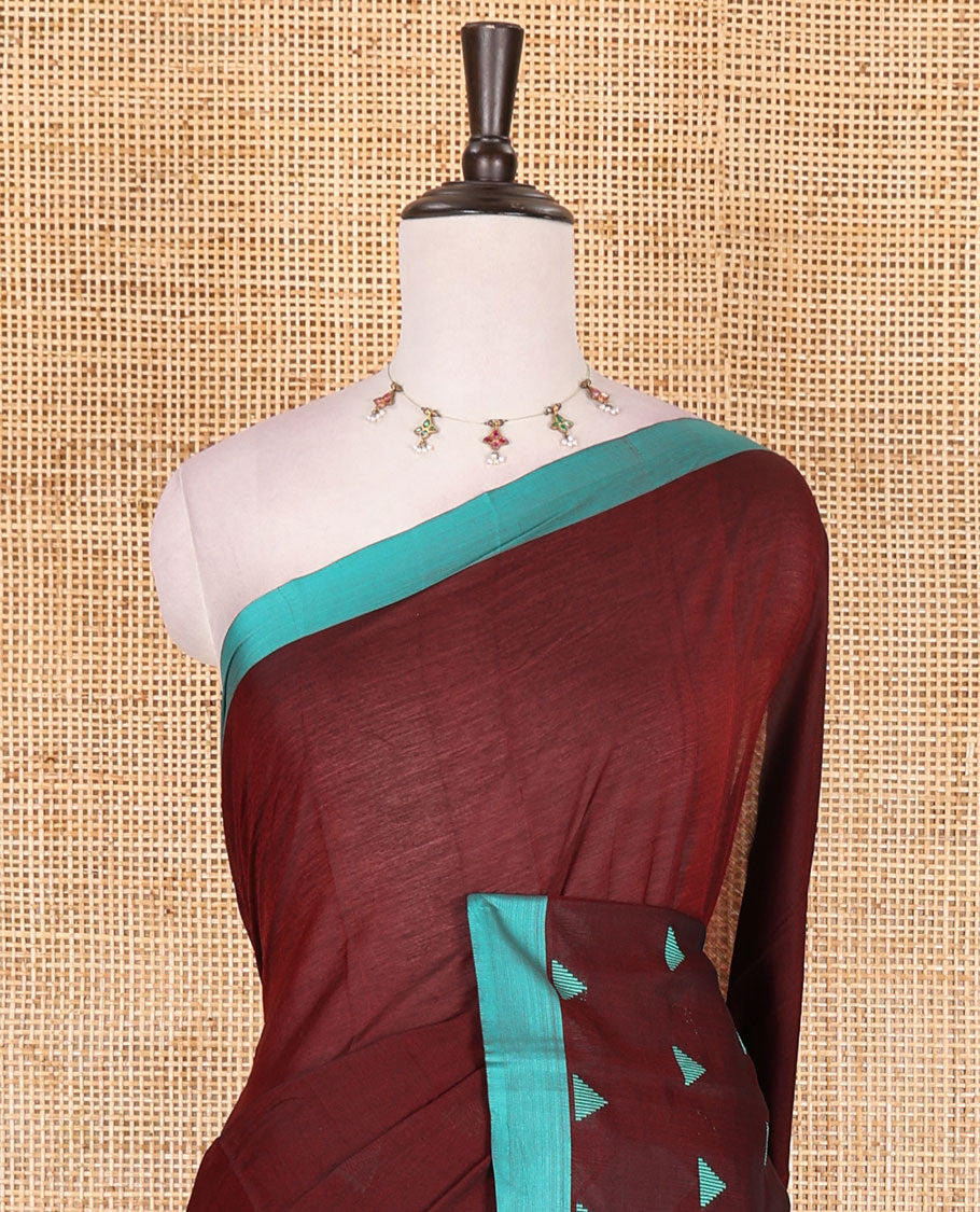 Maroon triangle motifs mercerised cotton saree, contrast plain border, striped pallu, and matching triangle motifs blouse