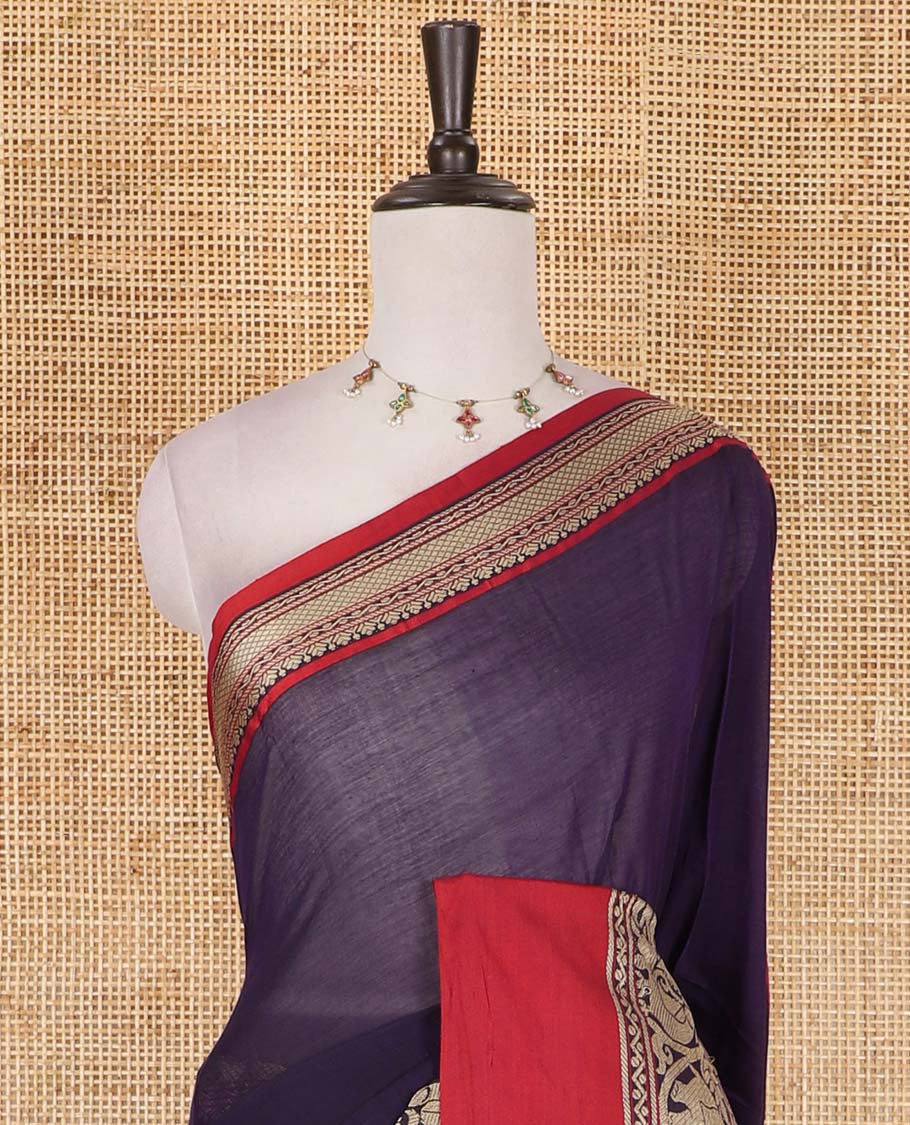 Purple plain mercerised cotton saree, contrast traditional border of peacock, and elephant motifs, striped pallu, and a matching blouse