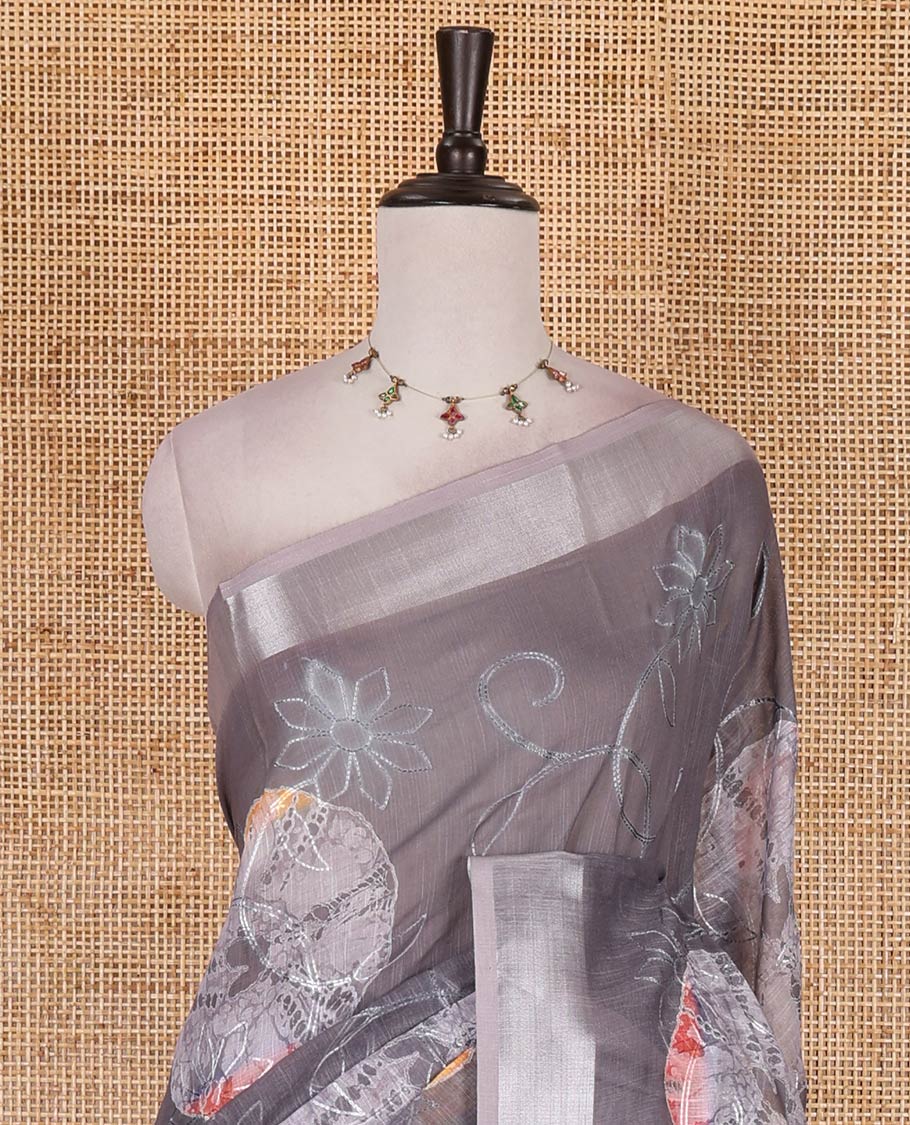 Grey shibori printed with thread floral vine embroidered linen cotton saree, contrast bavanji border, pallu, and blouse of shibori print with embroidery