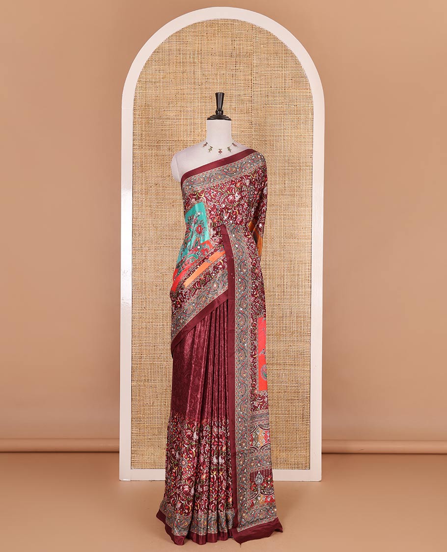 Maroon floral-paisleys printed and mirror work masakali saree, printed border, printed and mirror work pallu, and a matching printed blouse