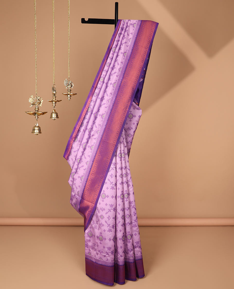 Lavender ikkat design mulberry silk saree with contrast border & ikkat pallu along with self embosed butta blouse