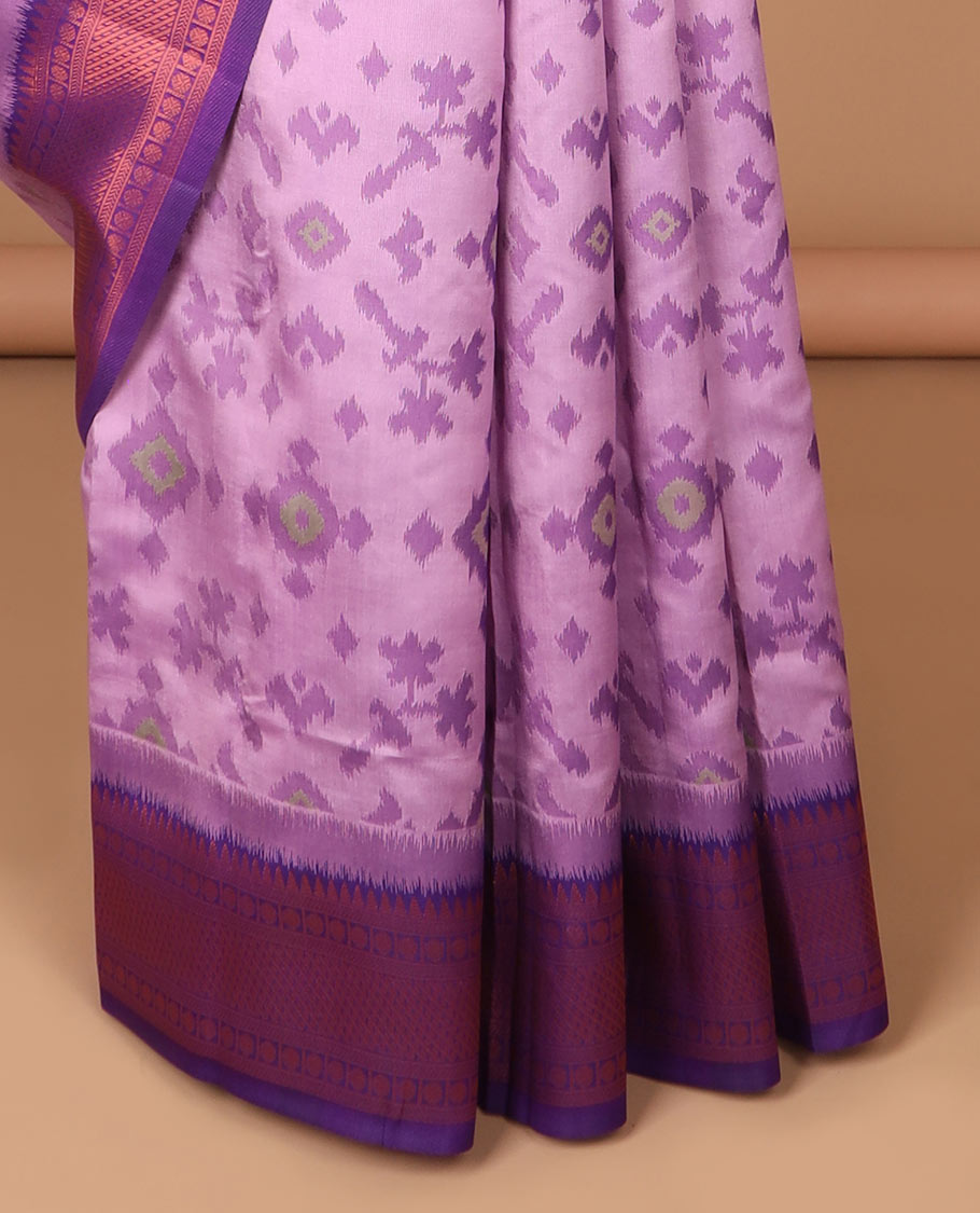 Lavender ikkat design mulberry silk saree with contrast border & ikkat pallu along with self embosed butta blouse