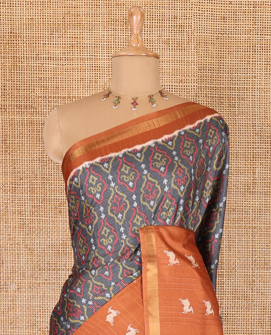 Grey and orange Pochampally ikkat printed katan silk saree, contrast deer motifs printed zari border, jaal printed pallu, and contrast deer motifs printed blouse
