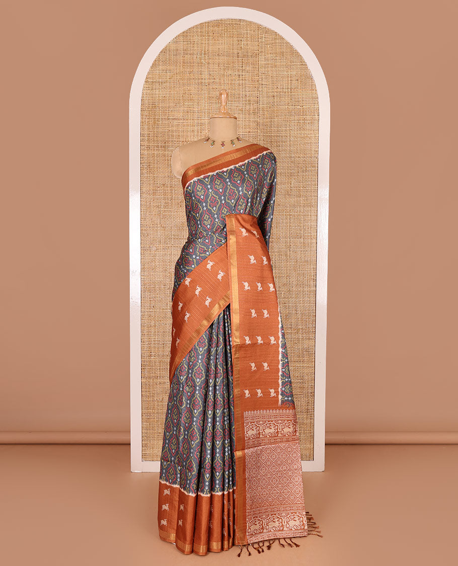 Grey and orange Pochampally ikkat printed katan silk saree, contrast deer motifs printed zari border, jaal printed pallu, and contrast deer motifs printed blouse