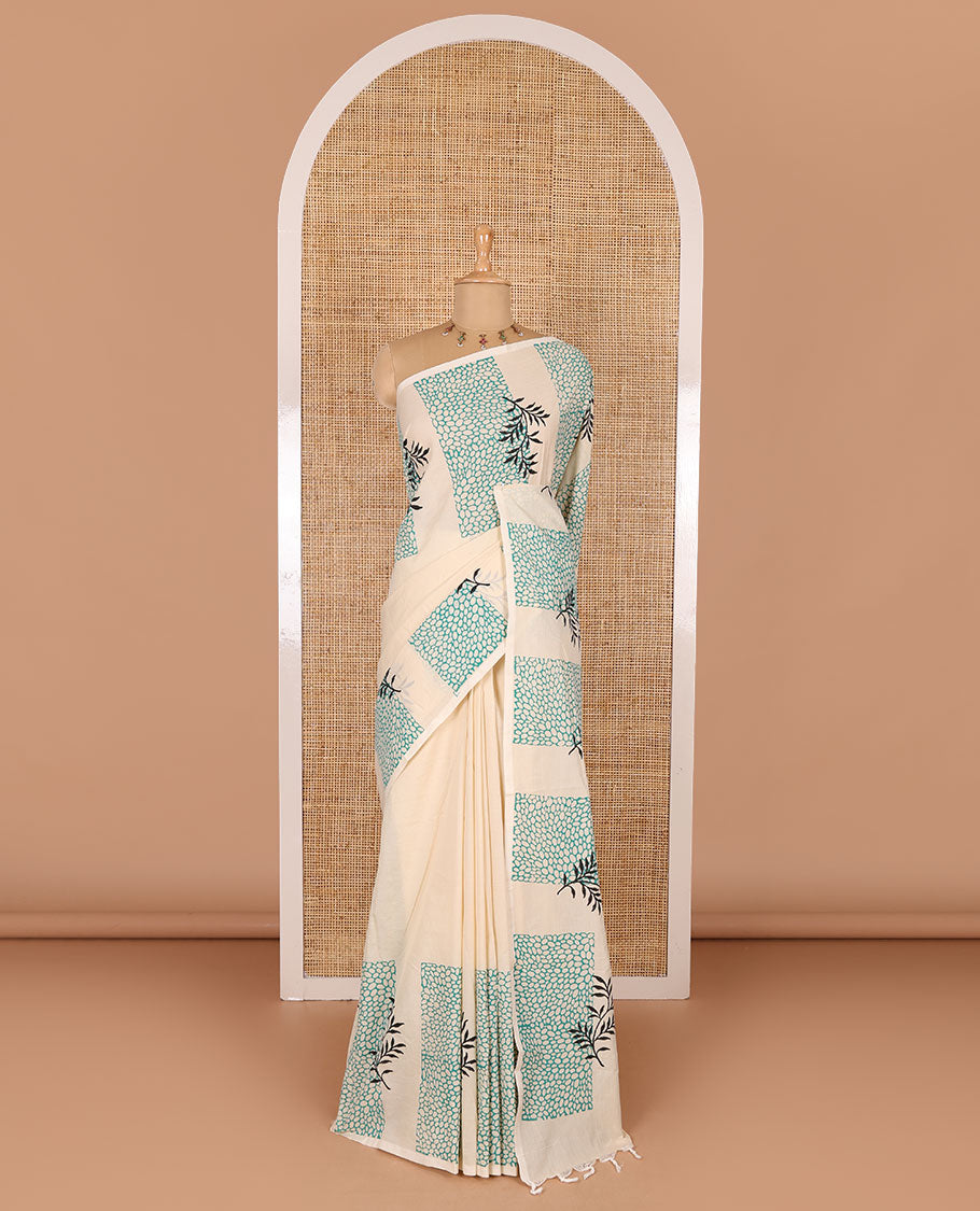 Cream plain South cotton saree, floral and honey hive printed border, a matching printed blouse, and a contrast floral vine printed blouse