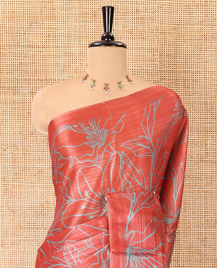 Borderless red big floral motifs printed tissue silk saree with floral printed pallu, and a contrast plain blouse