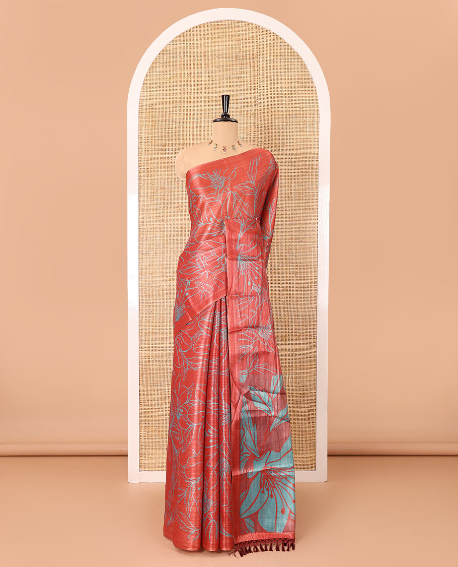 Borderless red big floral motifs printed tissue silk saree with floral printed pallu, and a contrast plain blouse