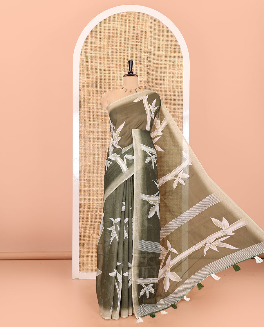 Olive green bamboo motifs printed chanderi cotton saree, contrast plain border, bamboo motifs printed pallu, and a contrast unique motifs printed blouse
