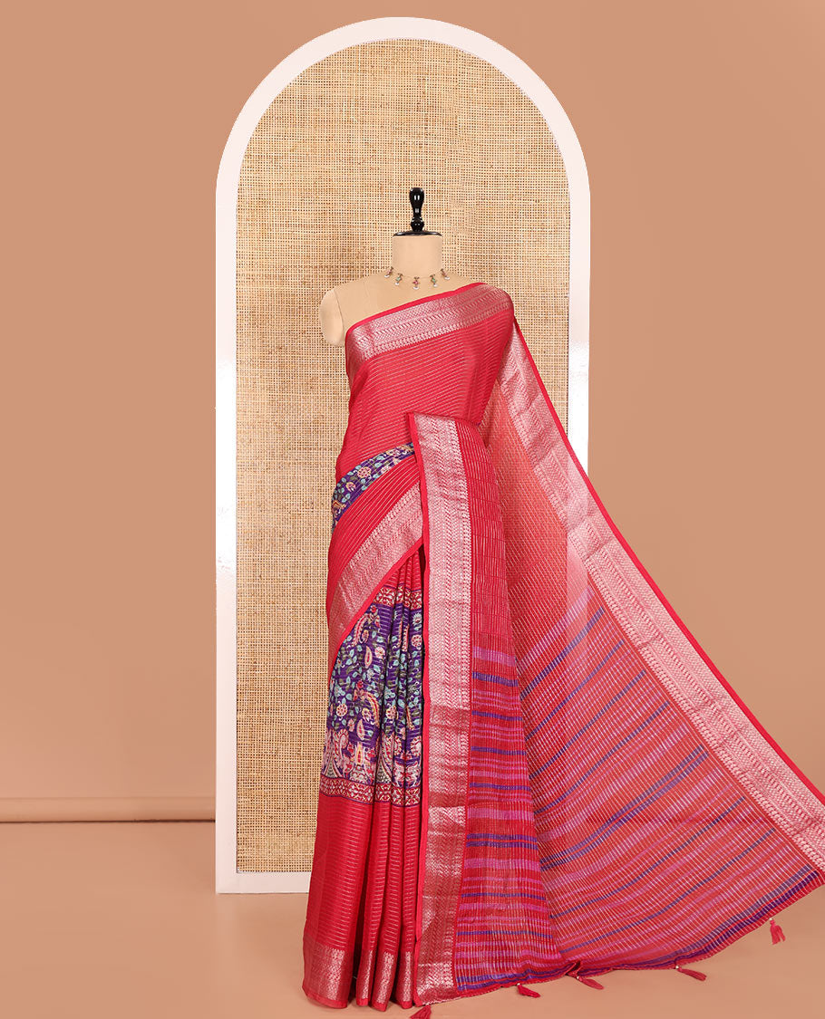 Rani Pink Viscose Georgette Adorned with Horizontal Zari Stripes and Kalamkari Flora-Paisley Prints, Complemented by a Traditional Zari Border, a Printed Pallu with Stripes, and a Matching Blouse