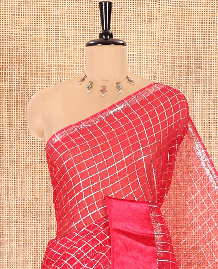 Rani Viscose Georgette Saree Gleamed with Golden Zari Checks All Over Its Body, Adorned with a Satin Plain Border, a Self Pallu Featuring the Same Checks, and Paired with a Running Blouse