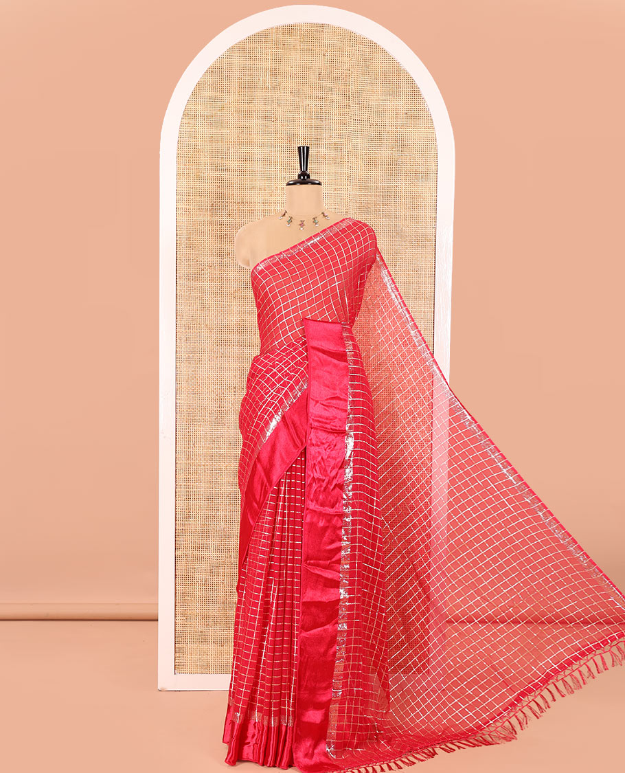 Rani Viscose Georgette Saree Gleamed with Golden Zari Checks All Over Its Body, Adorned with a Satin Plain Border, a Self Pallu Featuring the Same Checks, and Paired with a Running Blouse